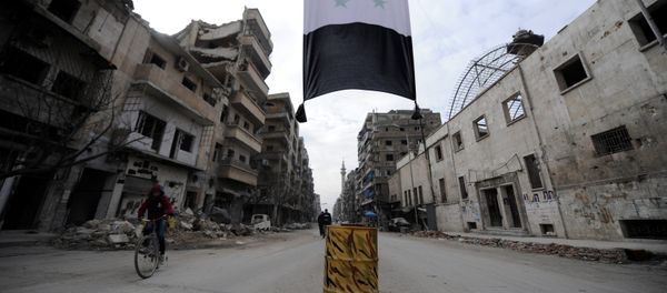 A Syrian national flag hangs in a damaged neighbourhood in Aleppo, Syria January 30, 2017 A Syrian national flag hangs in a damaged neighbourhood in Aleppo, Syria January 30, 2017 - Sputnik International
