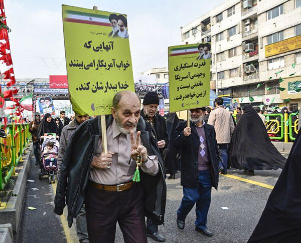 Iranians marching during rally in Tehran Iranians marching during rally in Tehran - Sputnik International