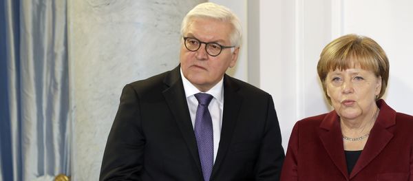 German Chancellor Angela Merkel, right, and German Foreign Minister Frank-Walter Steinmeier, left, talk as they pose for the media during a New Year's reception of German President Joachim Gauck at the Bellevue palace in Berlin, Germany, Tuesday, January 10, 2017. German Chancellor Angela Merkel, right, and German Foreign Minister Frank-Walter Steinmeier, left, talk as they pose for the media during a New Year's reception of German President Joachim Gauck at the Bellevue palace in Berlin, Germany, Tuesday, January 10, 2017. - Sputnik International