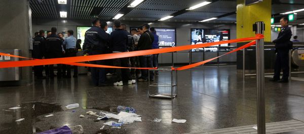 Police officers stand guard inside Tsim Sha Tsui subway station in Hong Kong, China - Sputnik International