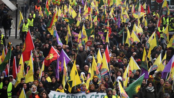 Kurds wave flags and banners of convicted Kurdistan Worker's Party (PKK) leader Abdullah Ocalan during a demonstration by several thousand people from all around Europe asking for Ocalan's release in Strasbourg, eastern France - Sputnik International
