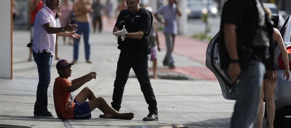 Civil police detain looters after they were shot in their legs, in Vitoria, Espirito Santo state, Brazil, Monday, Feb 6, 2017. Protests by the friends and family of military police in Espirito Santo have led to an increase in crime and forced the shut-down of some state services, authorities said Monday. Civil police detain looters after they were shot in their legs, in Vitoria, Espirito Santo state, Brazil, Monday, Feb 6, 2017. Protests by the friends and family of military police in Espirito Santo have led to an increase in crime and forced the shut-down of some state services, authorities said Monday. - Sputnik International