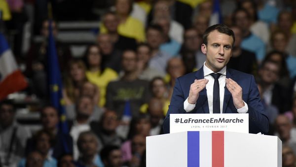 Former French Economy Minister, founder and president of the political movement En Marche ! and candidate for the France's 2017 presidential elections Emmanuel Macron speaks during a public meeting at the Palais des Sports in Lyon, on February 4, 2017 Former French Economy Minister, founder and president of the political movement En Marche ! and candidate for the France's 2017 presidential elections Emmanuel Macron speaks during a public meeting at the Palais des Sports in Lyon, on February 4, 2017 - Sputnik International