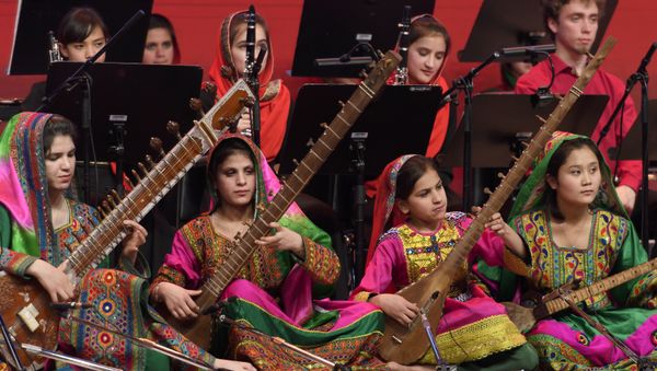 Afghanistan's first all-female orchestra performs during the closing ceremony of the World Economic Forum on January 20,2017 in Davos - Sputnik International