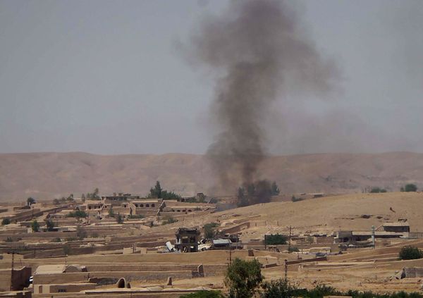 Smoke rises following fighting between the Afghan National Army and Taliban insurgents in the Sangin district of Helmand province (File) - Sputnik International