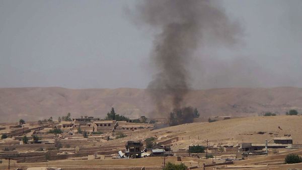 Smoke rises following fighting between the Afghan National Army and Taliban insurgents in the Sangin district of Helmand province (File) Smoke rises following fighting between the Afghan National Army and Taliban insurgents in the Sangin district of Helmand province (File) - Sputnik International