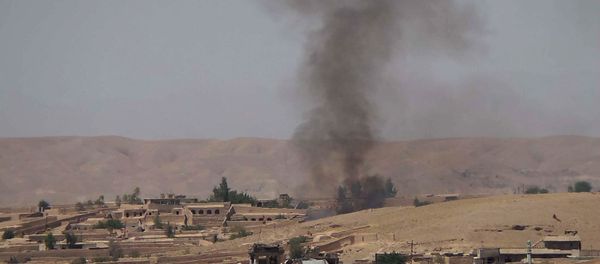 Smoke rises following fighting between the Afghan National Army and Taliban insurgents in the Sangin district of Helmand province (File) - Sputnik International
