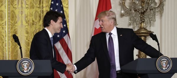 President Donald Trump shakes hands with Canadian Prime Minister Justin Trudeau during their joint news conference in the East Room of the White House President Donald Trump shakes hands with Canadian Prime Minister Justin Trudeau during their joint news conference in the East Room of the White House - Sputnik International