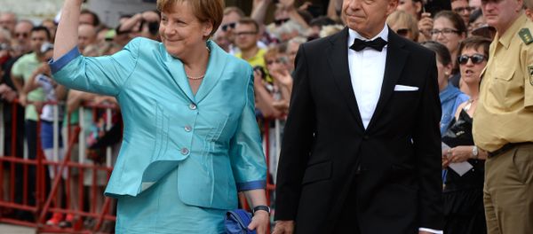 German Chancellor Angela Merkel (L) and her husband Joachim Sauer arrive for the opening of the Bayreuth Wagner Opera Festival with the production Tristan und Isolde at the opera house in the southern German city of Bayreuth on July 25, 2015 German Chancellor Angela Merkel (L) and her husband Joachim Sauer arrive for the opening of the Bayreuth Wagner Opera Festival with the production Tristan und Isolde at the opera house in the southern German city of Bayreuth on July 25, 2015 - Sputnik International