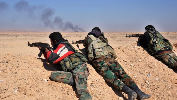 Syrian regime forces fire towards Islamic State group positions as they advance towards Hayyan oil field, east of the central Syrian Homs province on February 7, 2017 Syrian regime forces fire towards Islamic State group positions as they advance towards Hayyan oil field, east of the central Syrian Homs province on February 7, 2017 - Sputnik International