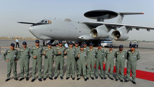 Indian Air Force (IAF) officers and crew of the Airborne Warning and Control System (AWACS) aeroplane pose for the media during the induction ceremony of the first AWACS equipped IL-76 aircraft at Air Foce station in New Delhi (File) Indian Air Force (IAF) officers and crew of the Airborne Warning and Control System (AWACS) aeroplane pose for the media during the induction ceremony of the first AWACS equipped IL-76 aircraft at Air Foce station in New Delhi (File) - Sputnik International
