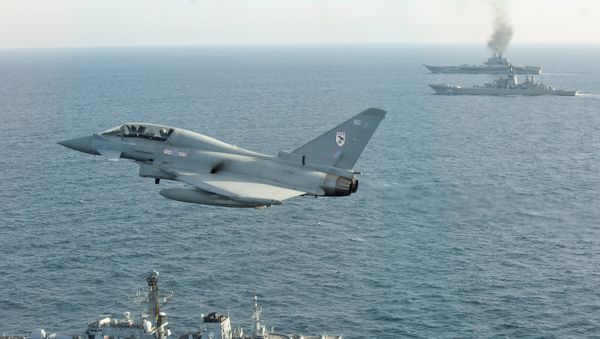 British Navy and Air Force escort Russian warships Admiral Kuznetsov and Pyotr Veliky - Sputnik International