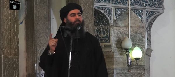 This July 5, 2014 photo shows an image grab taken from a propaganda video released by al-Furqan Media allegedly showing the leader of the Islamic State (IS) jihadist group, Abu Bakr al-Baghdadi, aka Caliph Ibrahim, adressing Muslim worshippers at a mosque in the militant-held northern Iraqi city of Mosul - Sputnik International