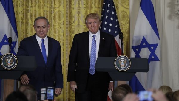 President Donald Trump and Israeli Prime Minister Benjamin Netanyahu participate in a joint news conference in the East Room of the White House - Sputnik International