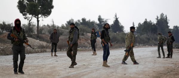 Free Syrian Army fighters carry their weapons as they stand on the outskirts of the northern Syrian town of al-Bab, Syria February 4, 2017. Free Syrian Army fighters carry their weapons as they stand on the outskirts of the northern Syrian town of al-Bab, Syria February 4, 2017. - Sputnik International