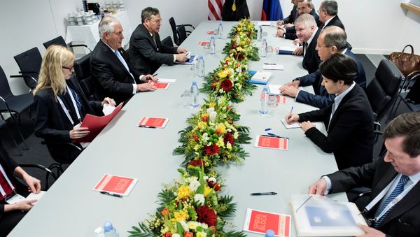 US Secretary of State Rex Tillerson (2ndL), Russia's Foreign Minister Sergei Lavrov (3rdR) and others wait for the start of a meeting at the World Conference Center in Bonn, Germany February 16, 2017. US Secretary of State Rex Tillerson (2ndL), Russia's Foreign Minister Sergei Lavrov (3rdR) and others wait for the start of a meeting at the World Conference Center in Bonn, Germany February 16, 2017. - Sputnik International