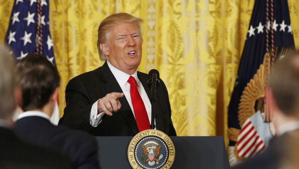 U.S. President Donald Trump gestures as he leaves the podium after a news conference at the White House in Washington, U.S., February 16, 2017. - Sputnik International