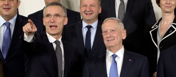 NATO Secretary General Jens Stoltenberg, front left, and U.S. Secretary of Defense Jim Mattis, front left, stand with other NATO defense ministers during a group photo at NATO headquarters in Brussels on Wednesday, Feb. 15, 2017. NATO Secretary General Jens Stoltenberg, front left, and U.S. Secretary of Defense Jim Mattis, front left, stand with other NATO defense ministers during a group photo at NATO headquarters in Brussels on Wednesday, Feb. 15, 2017. - Sputnik International