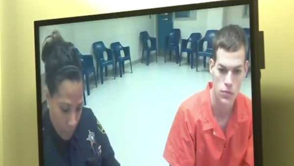 Johnathan Cromwell, seated right, charged with shooting and killing 60-year-old Jiansheng Chen - Sputnik International