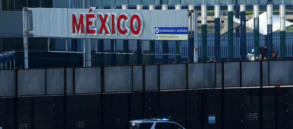 A U.S. border patrol vehicle drives along the border wall between Mexico and the United States in San Ysidro, California, U.S. A U.S. border patrol vehicle drives along the border wall between Mexico and the United States in San Ysidro, California, U.S. - Sputnik International