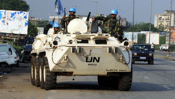 Bangladeshi UN peacekeepers patrol the Abobo neighbourhood in Abidjan on December 27, 2010 - Sputnik International