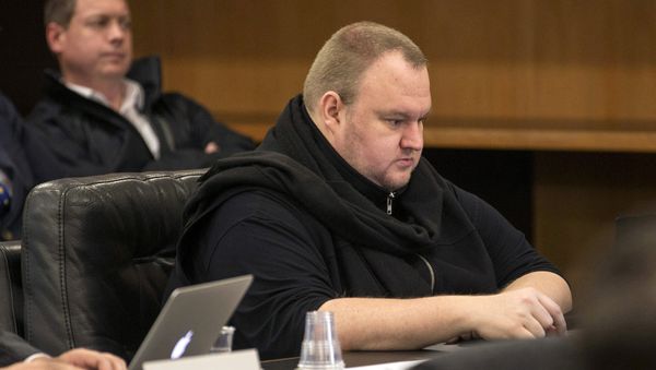 German tech entrepreneur Kim Dotcom sits in a chair during a court hearing in Auckland, New Zealand, September 24, 2015 - Sputnik International