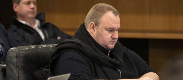 German tech entrepreneur Kim Dotcom sits in a chair during a court hearing in Auckland, New Zealand, September 24, 2015 - Sputnik International