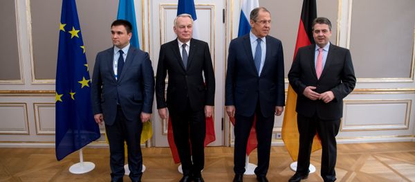 Foreign ministers of the so-called Normandy format (L to R) Ukraine's Foreign Minister Pavlo Klimkin, French Foreign Minister Jean-Marc Ayrault, Russian Foreign Minister Sergei Lavrov and German Foreign Minister Sigmar Gabriel pose for a photographer ahead talks at the 53rd Munich Security Conference (MSC) at the Bayerischer Hof hotel in Munich, southern Germany, on February 18, 2017 - Sputnik International