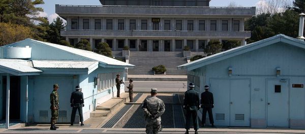 A view from South Korea towards North Korea in the Joint Security Area at Panmunjom. North and South Korean military personnel, as well as a single US soldier, are shown A view from South Korea towards North Korea in the Joint Security Area at Panmunjom. North and South Korean military personnel, as well as a single US soldier, are shown - Sputnik International