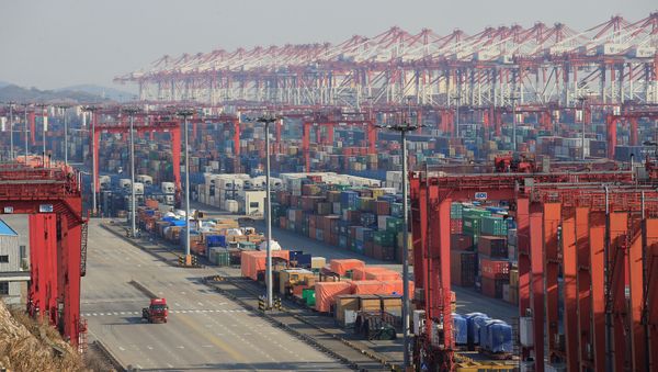 Containers are seen at the Yangshan Deep Water Port, part of the Shanghai Free Trade Zone, in Shanghai, China, February 13, 2017 Containers are seen at the Yangshan Deep Water Port, part of the Shanghai Free Trade Zone, in Shanghai, China, February 13, 2017 - Sputnik International