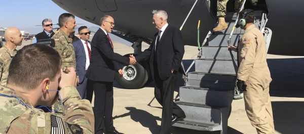 U.S. Secretary of Defense Jim Mattis, center, is greeted by U.S. Ambassador Douglas Silliman as he arrives at Baghdad International Airport on an unannounced trip Monday, Feb. 20, 2017. U.S. Secretary of Defense Jim Mattis, center, is greeted by U.S. Ambassador Douglas Silliman as he arrives at Baghdad International Airport on an unannounced trip Monday, Feb. 20, 2017. - Sputnik International