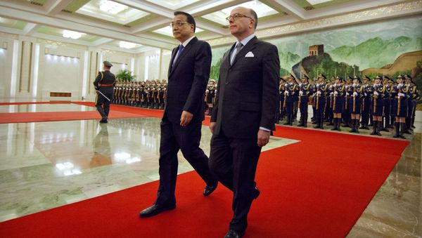Chinese Premier Li Keqiang, left, and French Prime Minister Bernard Cazeneuve, right, walk together during a welcome ceremony at the Great Hall of the People in Beijing, Tuesday, Feb. 21, 2017 Chinese Premier Li Keqiang, left, and French Prime Minister Bernard Cazeneuve, right, walk together during a welcome ceremony at the Great Hall of the People in Beijing, Tuesday, Feb. 21, 2017 - Sputnik International