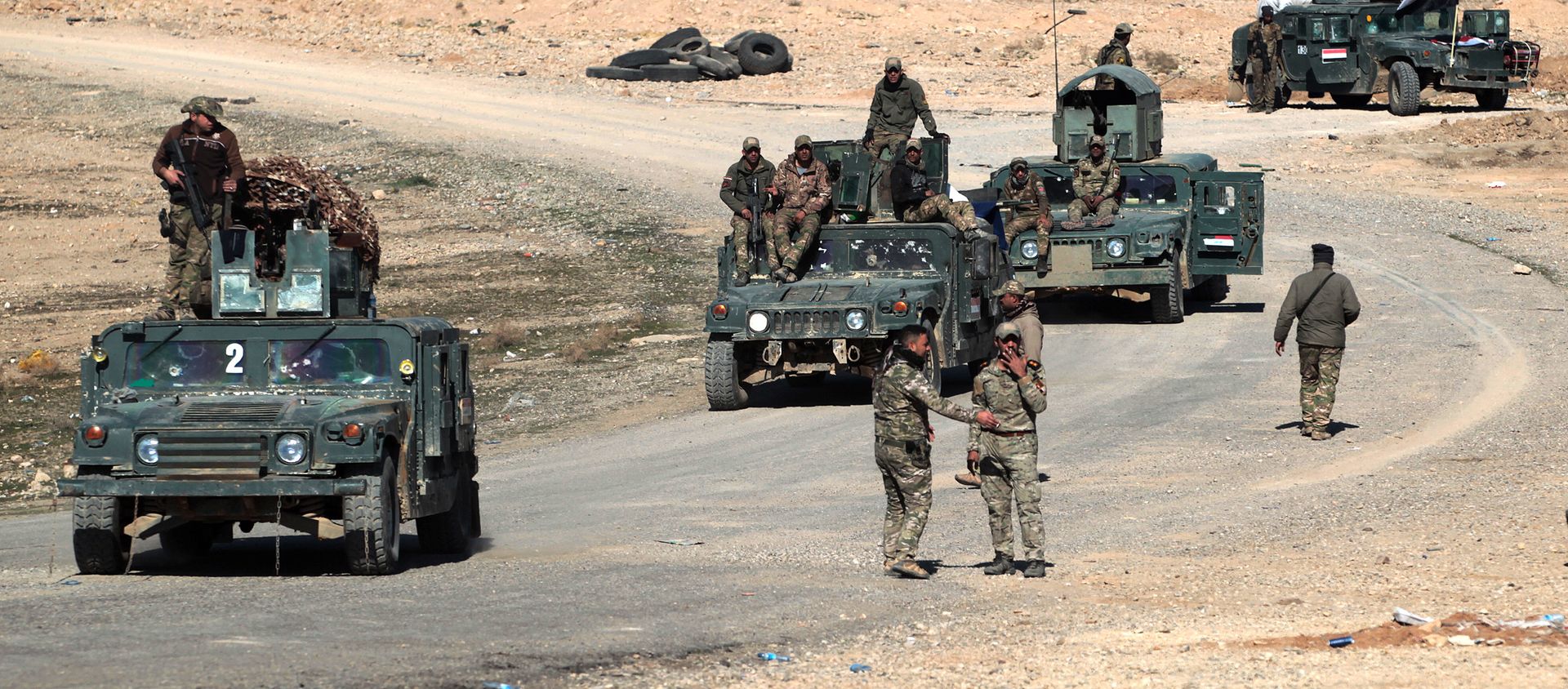 (File) Iraqi security forces drive in the village of al-Buseif, south of Mosul, after they recaptured the village from the control of the Islamic State (IS) group on February 21, 2017, during the ongoing military offensive to retake the western side of Mosul - Sputnik International, 1920, 07.12.2020