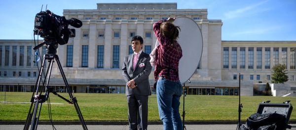 A TV journalist speaks on the eve of resumption of peace talks on Syria, on February 22, 2017 at the United Nations offices in Geneva A TV journalist speaks on the eve of resumption of peace talks on Syria, on February 22, 2017 at the United Nations offices in Geneva - Sputnik International
