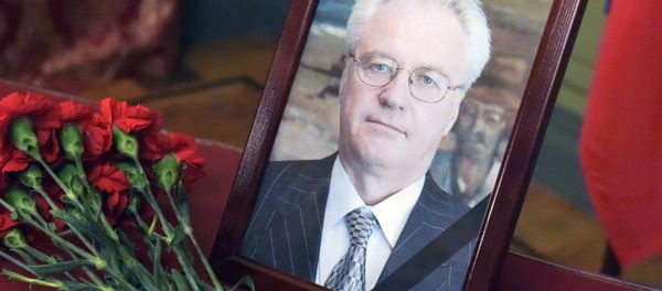 Flowers and portrait in the building of the Russian Foreign Ministry, a tribute to Vitaly Churkin, Permanent Representative of the Russian Federation to the United Nations. - Sputnik International
