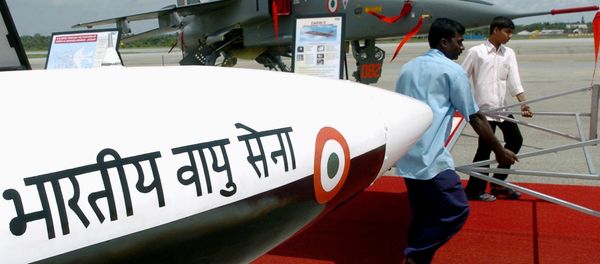 Workers of the Hindustan Aeronautics Limited (HAL) walk past a Lakshya (unmanned aerial vehicle) carrying a display board as Jaguar aircraft are on display at theHindustan Aeronautics Limited (HAL) airport in Bangalore Workers of the Hindustan Aeronautics Limited (HAL) walk past a Lakshya (unmanned aerial vehicle) carrying a display board as Jaguar aircraft are on display at theHindustan Aeronautics Limited (HAL) airport in Bangalore - Sputnik International