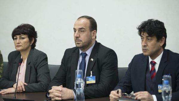 Syria's opposition delegation head Nasr al-Hariri, center, attends the Syria peace talks with U.N. Special Envoy for Syria Staffan de Mistura at the Palais des Nations in Geneva, Switzerland Syria's opposition delegation head Nasr al-Hariri, center, attends the Syria peace talks with U.N. Special Envoy for Syria Staffan de Mistura at the Palais des Nations in Geneva, Switzerland - Sputnik International
