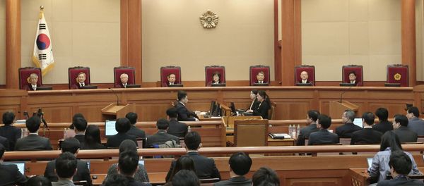 Judges of the Constitutional Court sit during the final hearing on whether to confirm the impeachment of President Park Geun-hye at the Constitutional Court in Seoul, South Korea, Febuary 27, 2017 Judges of the Constitutional Court sit during the final hearing on whether to confirm the impeachment of President Park Geun-hye at the Constitutional Court in Seoul, South Korea, Febuary 27, 2017 - Sputnik International