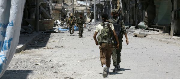 Members of the Syrian Democratic Forces (SDF) patrol a street in the northern Syrian town of Manbij (File) Members of the Syrian Democratic Forces (SDF) patrol a street in the northern Syrian town of Manbij (File) - Sputnik International