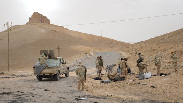 Syrian government army and militia fight for Palmyra Syrian government army and militia fight for Palmyra - Sputnik International
