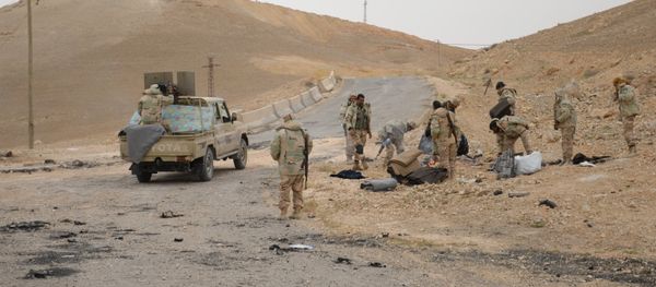 Syrian government army and militia fight for Palmyra Syrian government army and militia fight for Palmyra - Sputnik International