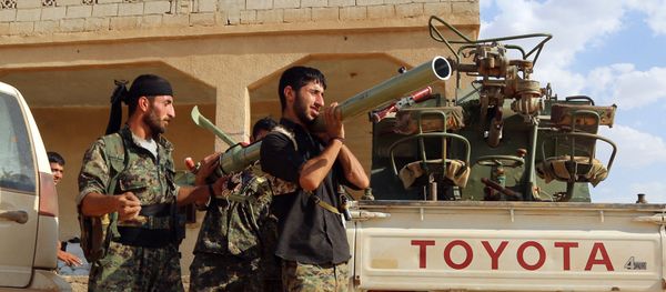 US-backed Kurdish and Arab fighters prepare a rocket-launcher as they advance into the Islamic State (IS) jihadist's group bastion of Manbij, in northern Syria (File) - Sputnik International
