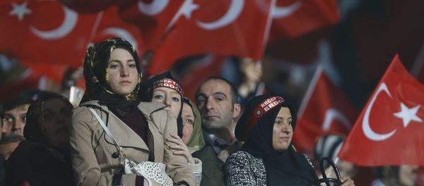 Supporters of the ruling AK Party wave Turkish flags during a campaign meeting for the April 16 constitutional referendum, in Ankara, Turkey, February 25, 2017. - Sputnik International