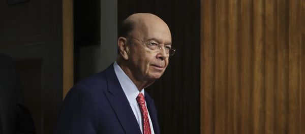 Commerce Secretary-designate Wilbur Ross returns back to the hearing room after a brief recess on Capitol Hill in Washington, Wednesday, Jan. 18, 2017, at his confirmation hearing before the Senate Commerce Committee Commerce Secretary-designate Wilbur Ross returns back to the hearing room after a brief recess on Capitol Hill in Washington, Wednesday, Jan. 18, 2017, at his confirmation hearing before the Senate Commerce Committee - Sputnik International