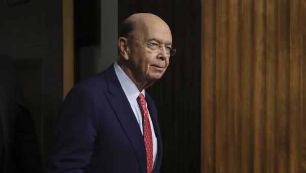 Commerce Secretary-designate Wilbur Ross returns back to the hearing room after a brief recess on Capitol Hill in Washington, Wednesday, Jan. 18, 2017, at his confirmation hearing before the Senate Commerce Committee Commerce Secretary-designate Wilbur Ross returns back to the hearing room after a brief recess on Capitol Hill in Washington, Wednesday, Jan. 18, 2017, at his confirmation hearing before the Senate Commerce Committee - Sputnik International