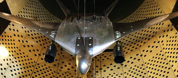 Plane model in wind tunnel - Sputnik International