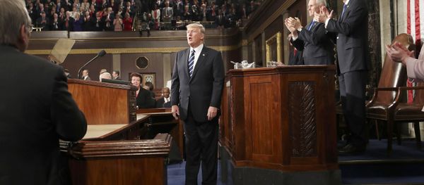 U.S. President Donald Trump is applauded after delivering his first address to a joint session of Congress from the floor of the House of Representatives iin Washington, U.S., February 28, 2017 - Sputnik International