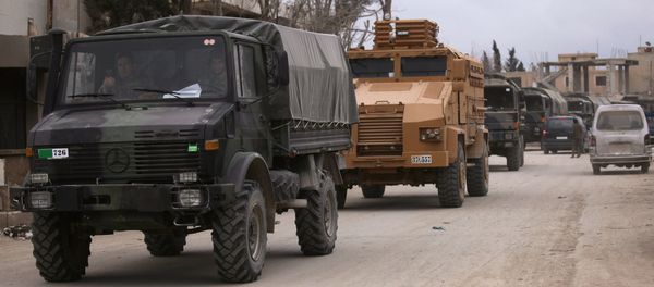 Turkish military vehicles drive in the Syrian rebel-held town of al-Rai, as they head towards the northern Syrian town of al-Bab, Syria March 2, 2017 Turkish military vehicles drive in the Syrian rebel-held town of al-Rai, as they head towards the northern Syrian town of al-Bab, Syria March 2, 2017 - Sputnik International