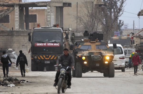 Turkish military vehicles drive in the Syrian rebel-held town of al-Rai, as they head towards the northern Syrian town of al-Bab, Syria March 2, 2017 - Sputnik International