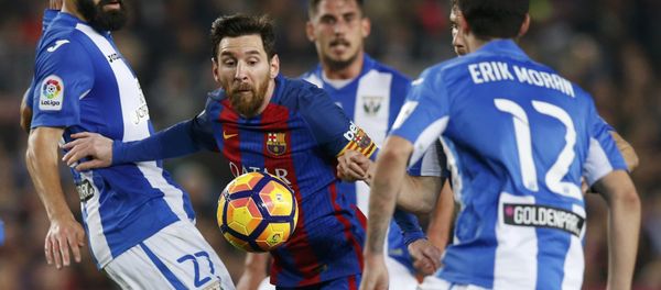 Football Soccer - Barcelona v Leganes - Spanish La Liga Santander - Camp Nou stadium, Barcelona, Spain - 19/02/17 - Barcelona's Lionel Messi in action against Leganes' Dimitris Siovas. Football Soccer - Barcelona v Leganes - Spanish La Liga Santander - Camp Nou stadium, Barcelona, Spain - 19/02/17 - Barcelona's Lionel Messi in action against Leganes' Dimitris Siovas. - Sputnik International